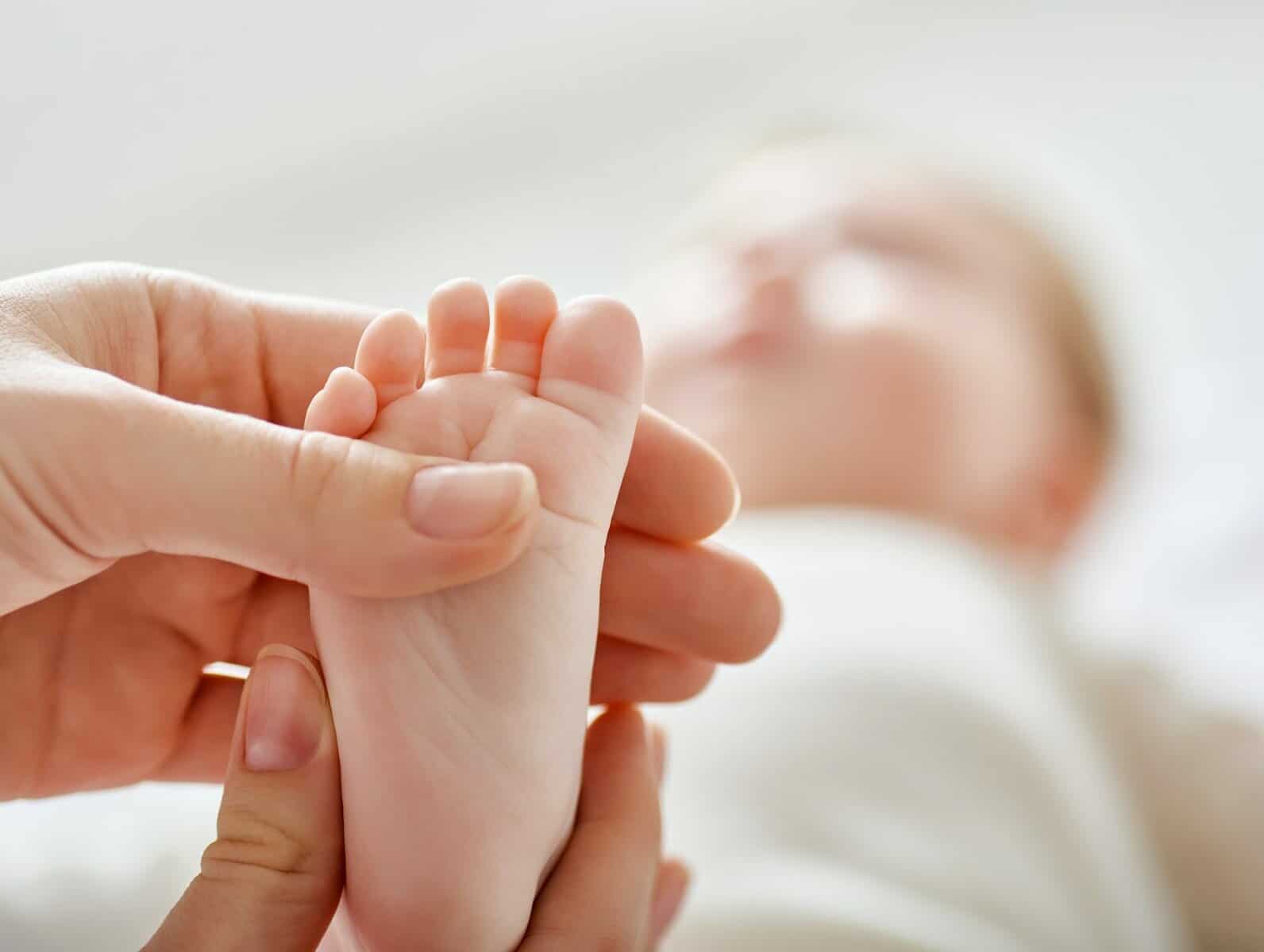 doctor examining a baby